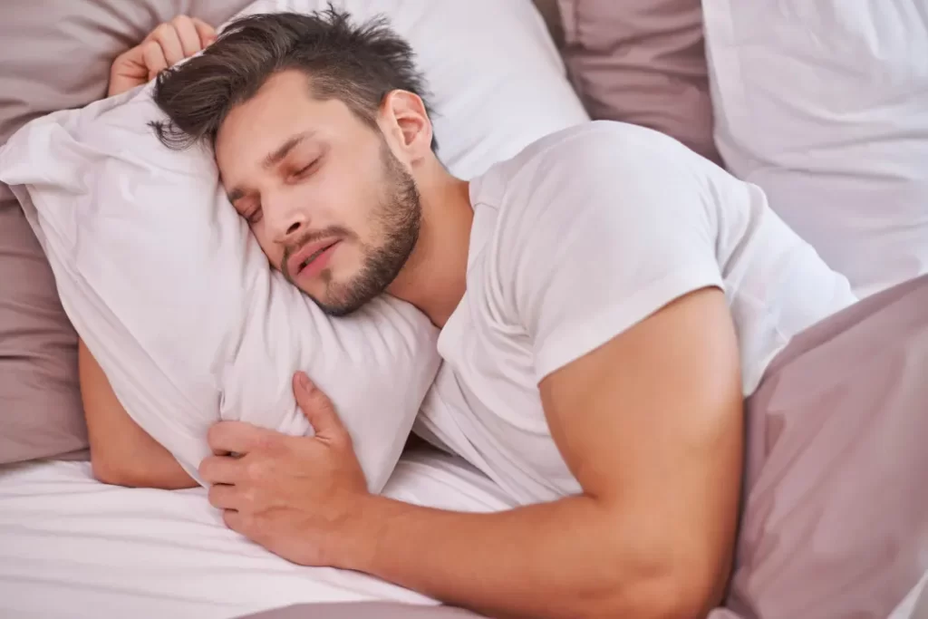 Attractive man sleeping deeply.