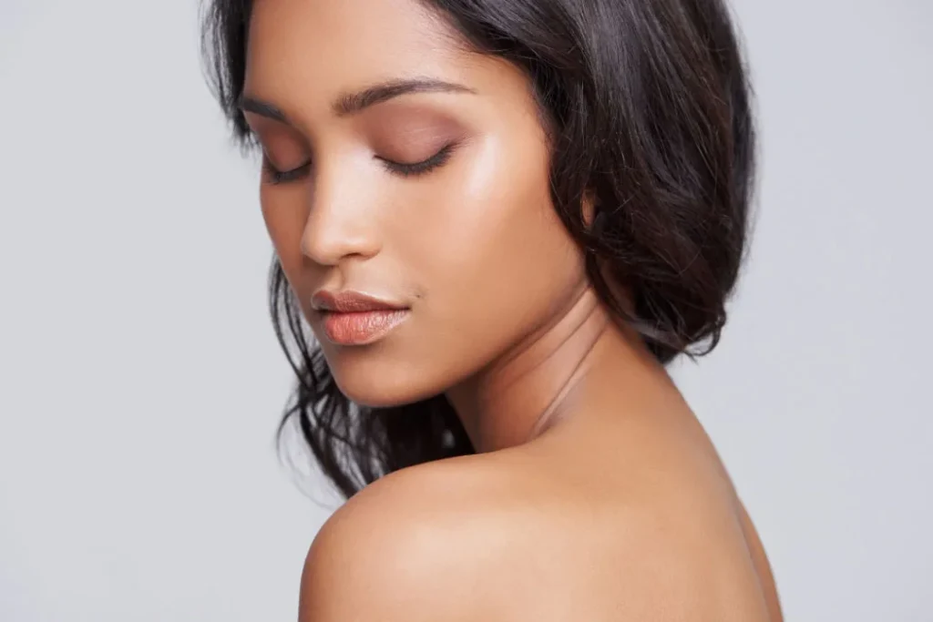 A brown girl having clear skin.