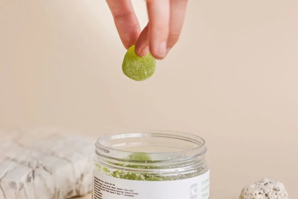 woman eating gummies