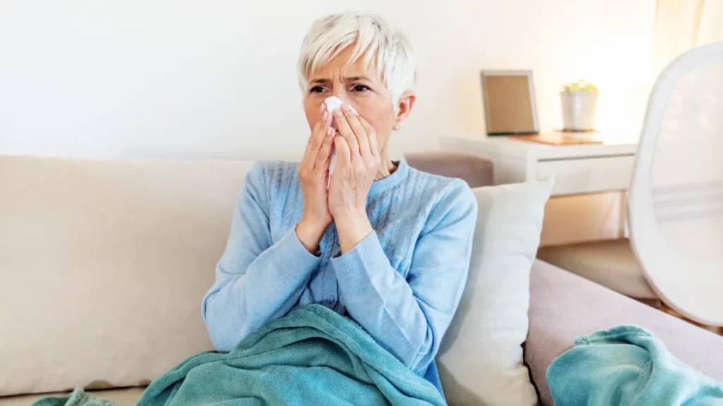 Old lady having flu.