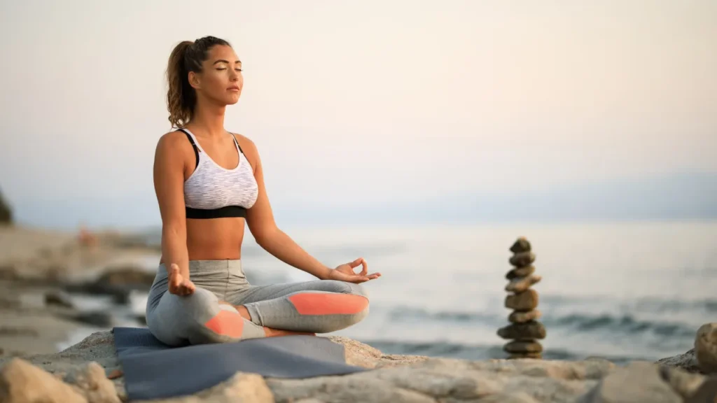 Lady is doing yoga.