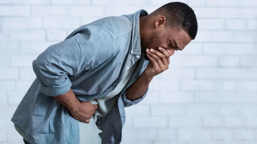Man feeling vomit.