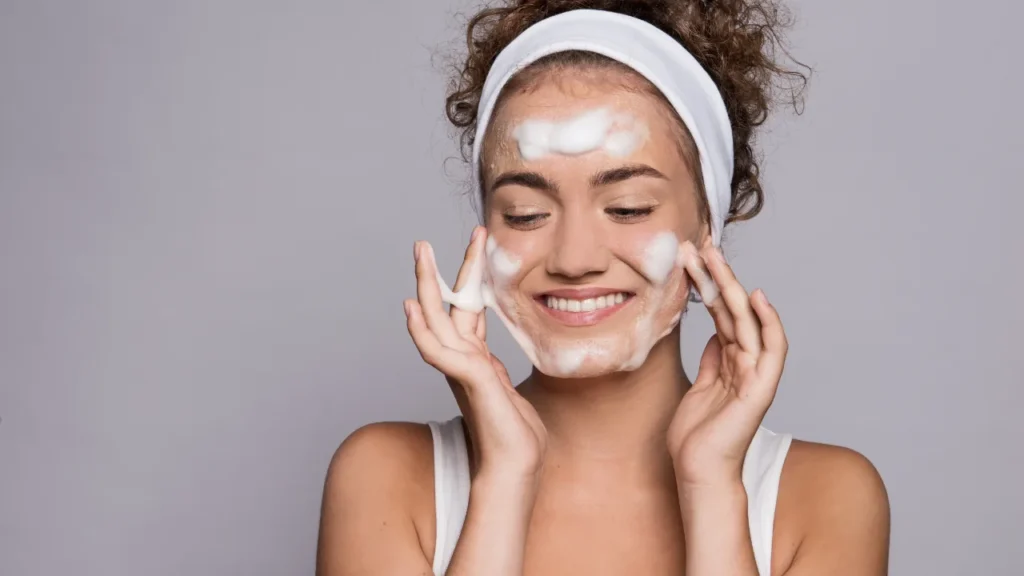 Young girl is doing skin care.